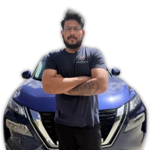 Locksmith Moab leaning on a blue Nissan SUV, Emergency Pro Locksmith automotive services in Florida