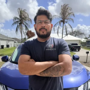 Emergency Pro Locksmith owner Moab unlocking a residential front door during a lockout service in Port St. Lucie, Florida